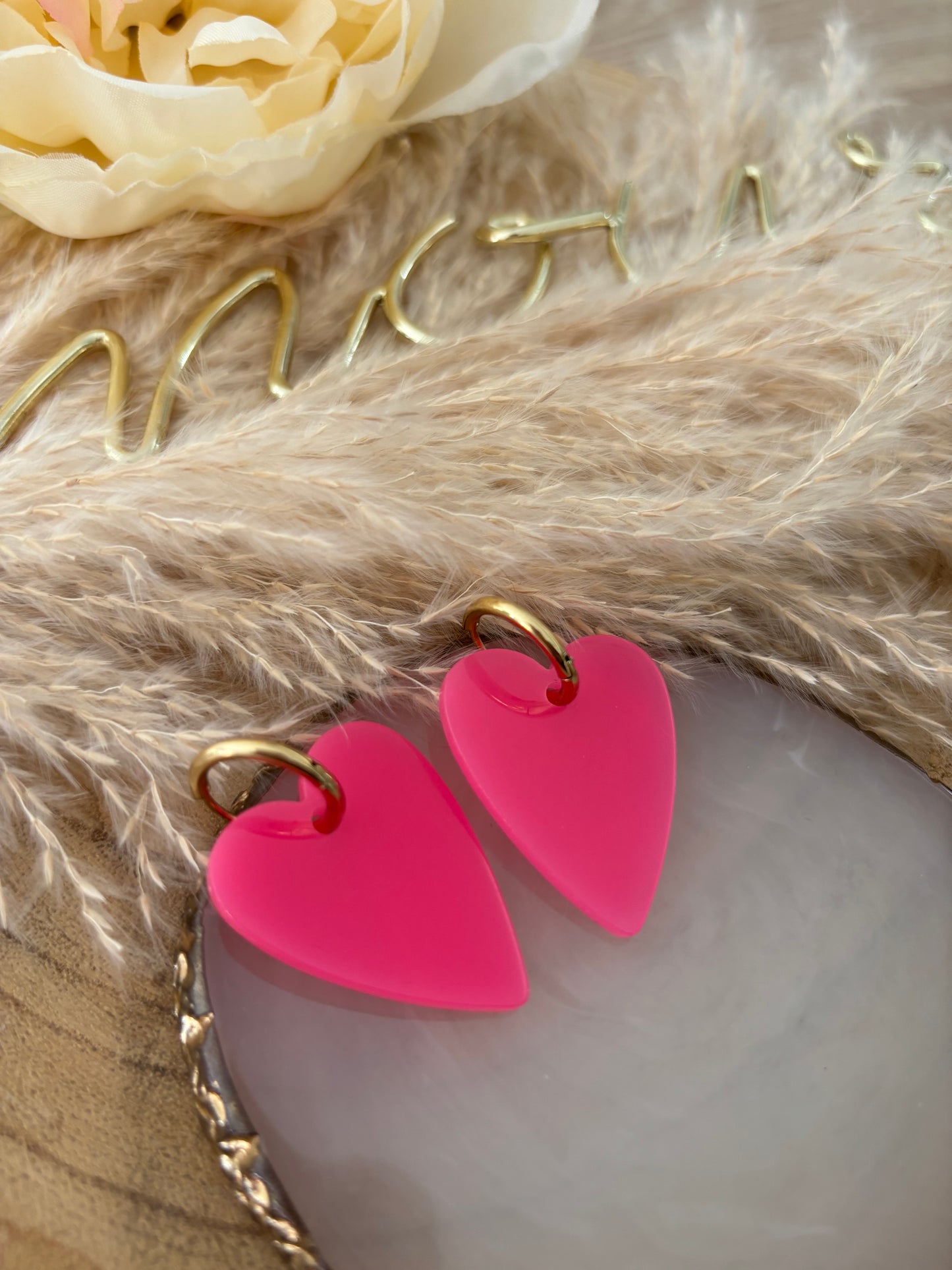 Boucles d’oreilles rose fluo